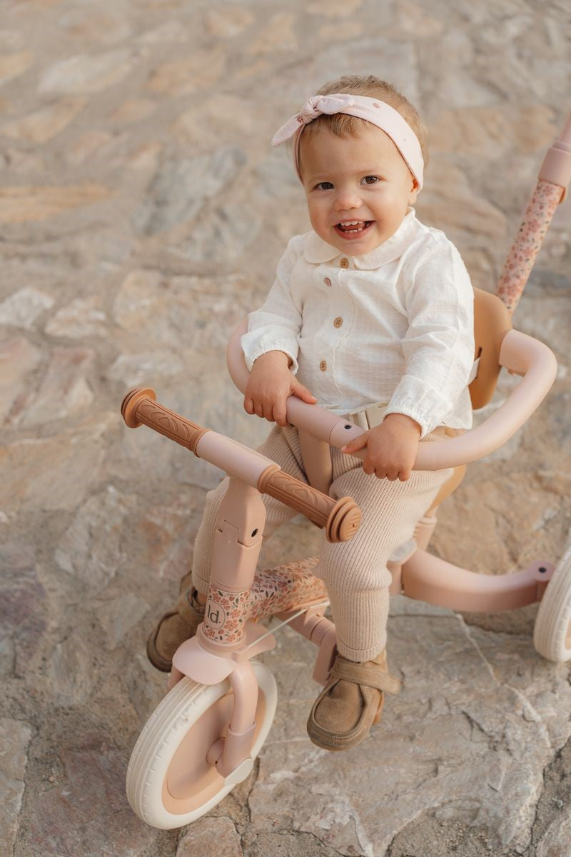Triciclo infantil 4 en 1 con barra rosa flores Little dutch