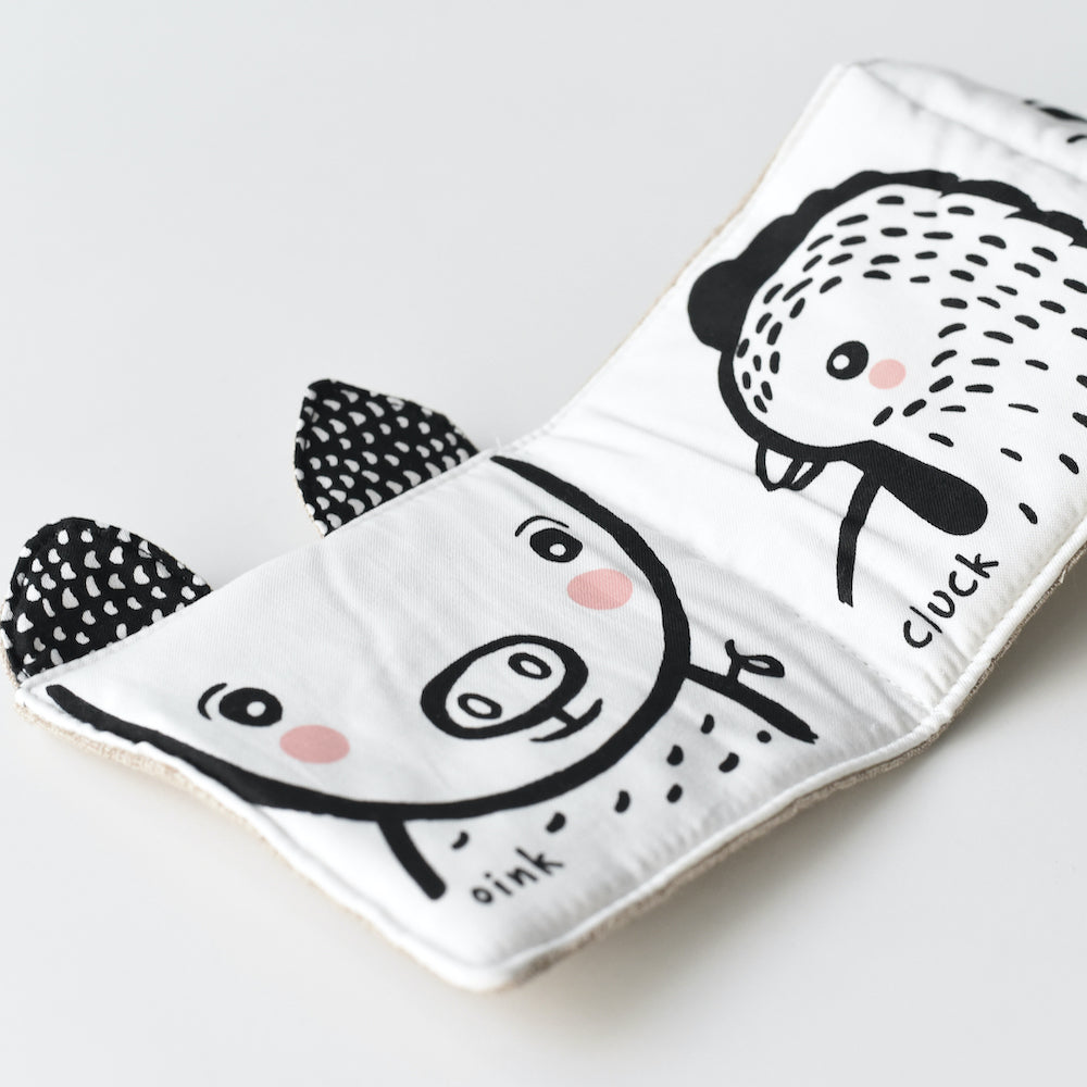 Libro blando de algodón  Friendly Faces - Granja Wee Gallery